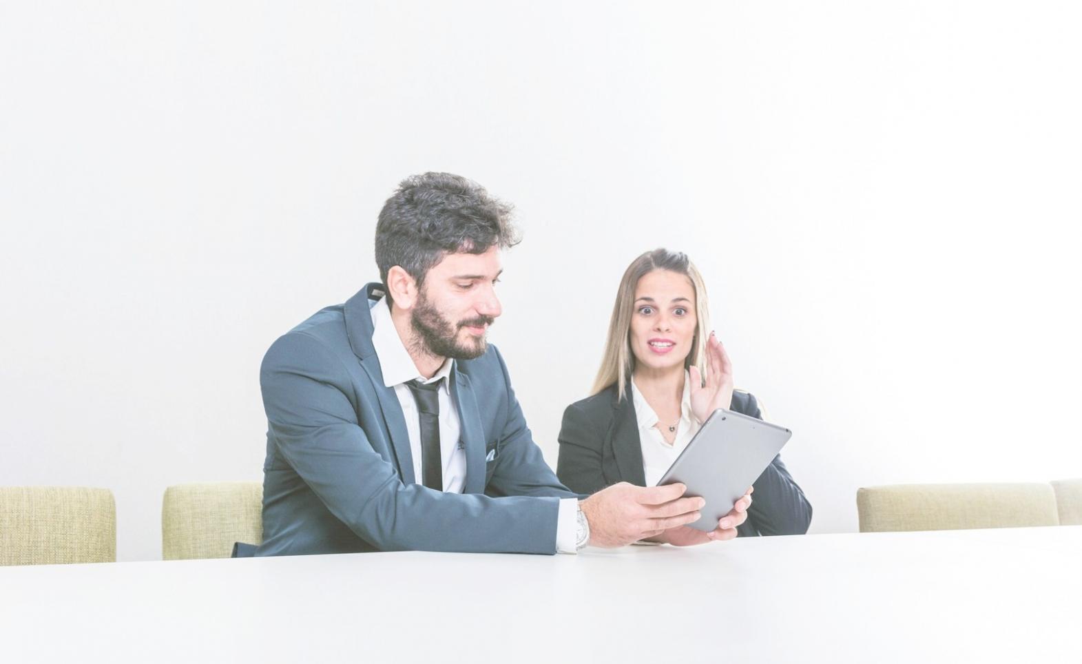 Professional financial planning session with documents and calculator